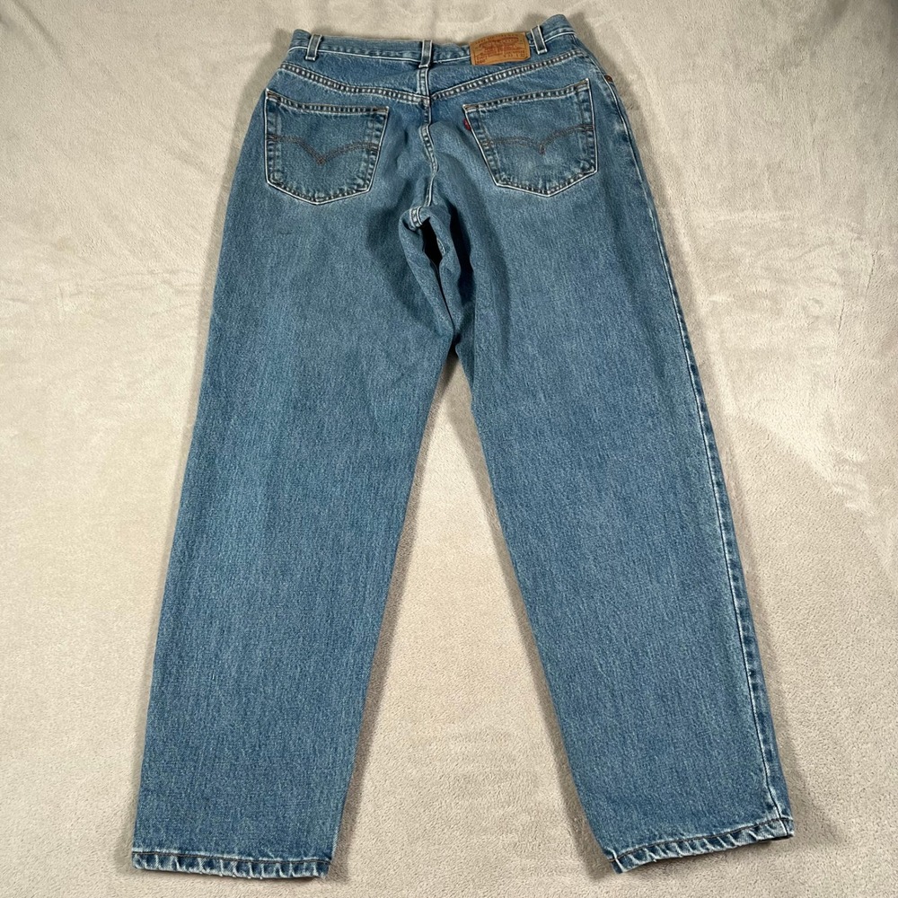 Vintage 90s Levis 560 Loose Fit Tapered Leg Jeans Men's 33x32 Medium Wash Blue